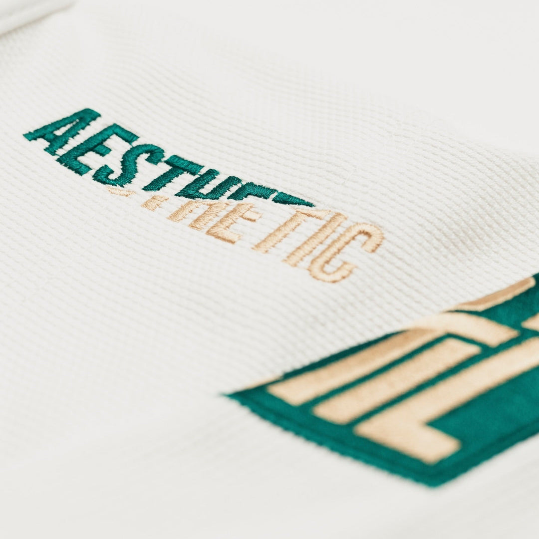 AESTHETIC The Competitor BJJ Gi Kimono - White/Pine Green Jacket logo detail